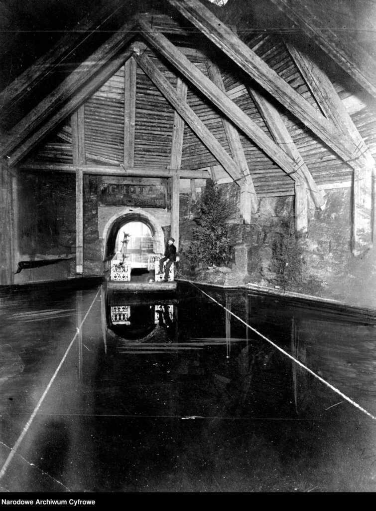 Archival photograph of miners and underground infrastructure in the Wieliczka Salt Mine