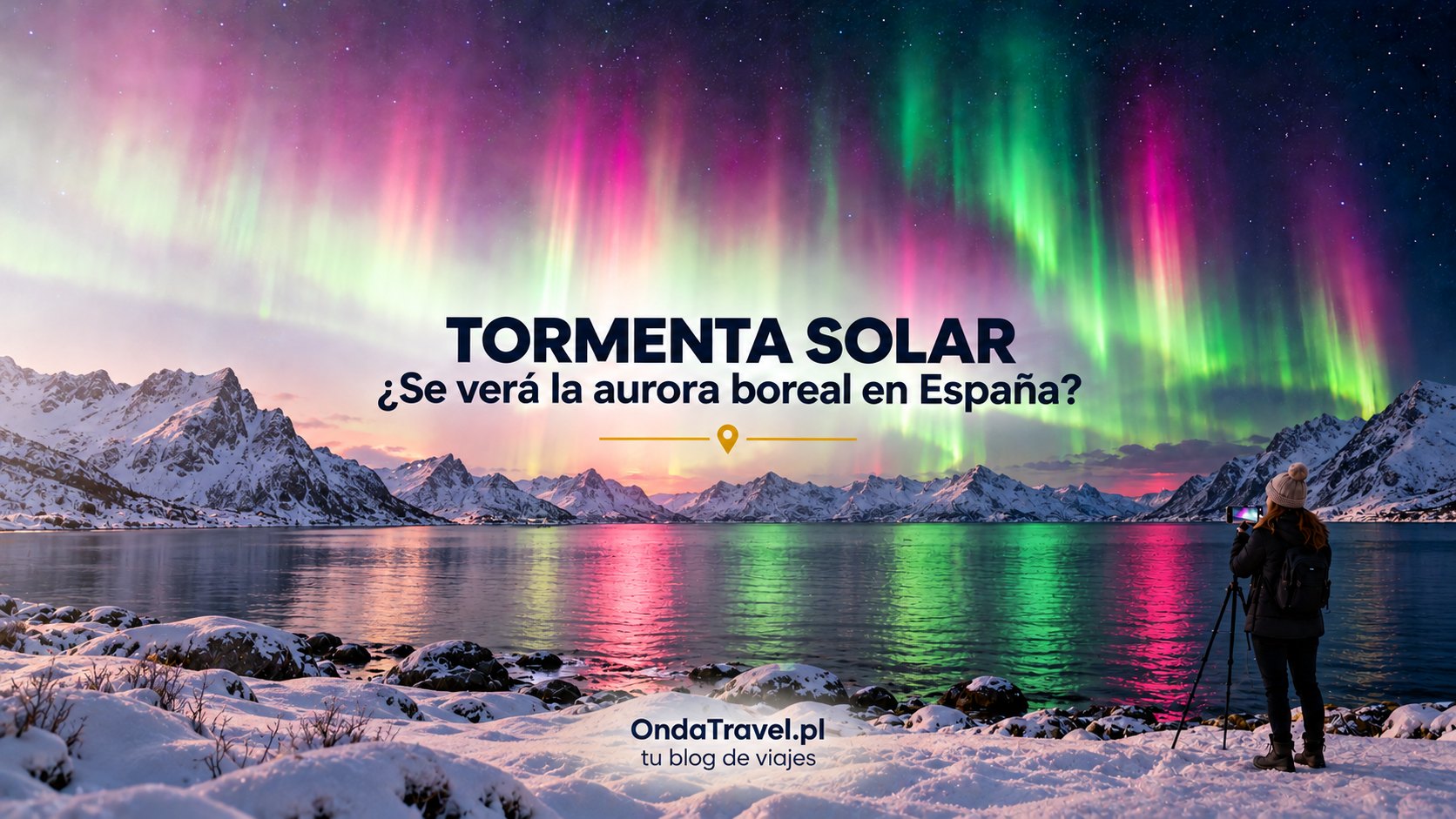 Aurora boreal sobre un fiordo nevado de Noruega durante la tormenta geomagnética de octubre de 2026, una mujer fotografía la aurora con el móvil